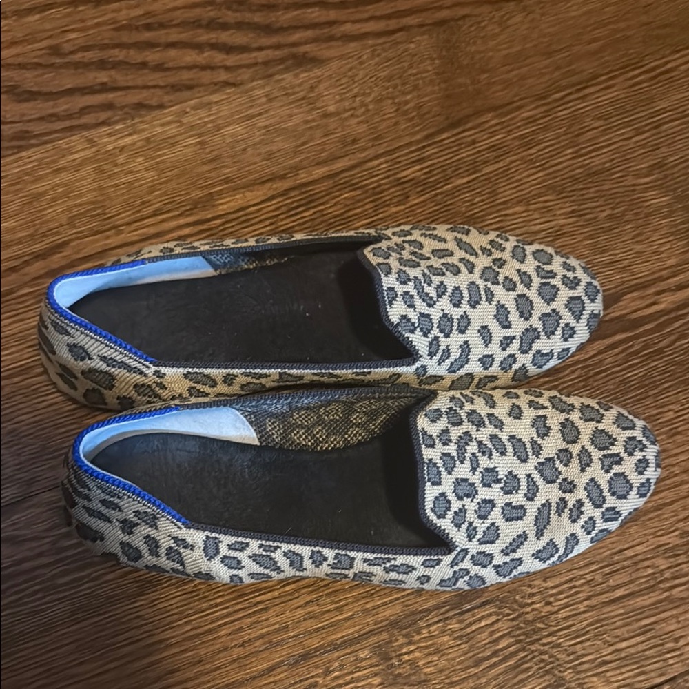 Rothy's Brown and Black Flats with leopard print